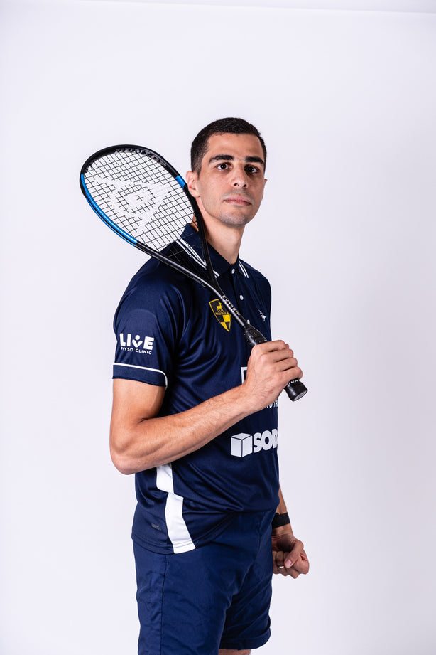 ali farag with dunlop fx 128 squash racket